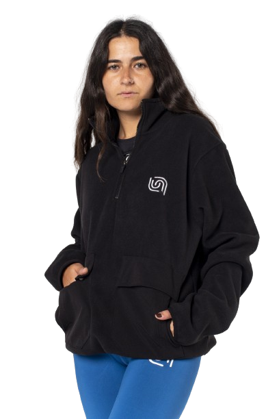 Girl standing in a stylish tracksuit from Beyond brand, showcasing modern sportswear